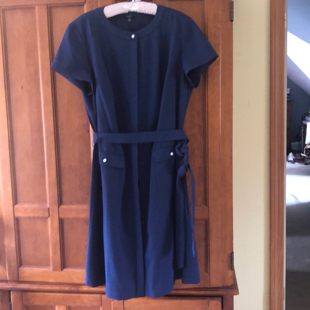 Gorgeous navy button up dress with pearl detail.